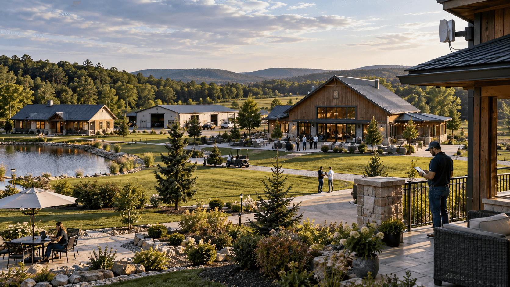 A multi-building rural property with separate structures connected by a visible point-to-point wireless link.